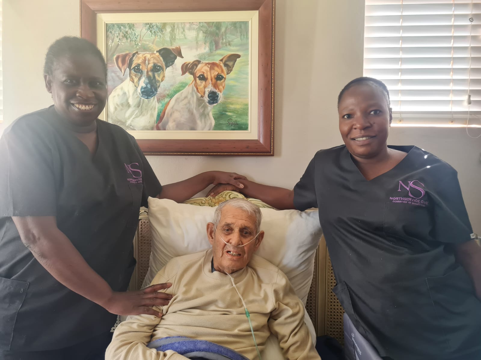 NorthServices Care caregivers supporting an elderly client at home